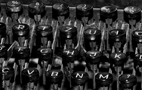 A black and white close-up of the keys from a vintage typewriter