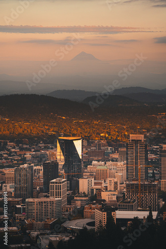 Portland, Oregon, USA skyline at dusk with Mt. Hood in the distance.
