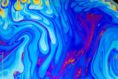 Psychedelic multicolored background abstract. Rainbow colors. patterns background. Photo macro shot of soap bubbles