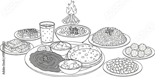 Diverse dishes and drink with a miniature campfire a feast