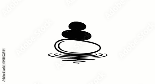 Stacked black stones create ripples in serene water