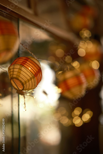 Chinese lanterns, lantern, decorative lamps, asian decor, oriental style, home interior, cozy home, warm light, ambient lighting, soft glow, cinematic lighting, evening atmosphere, night interior