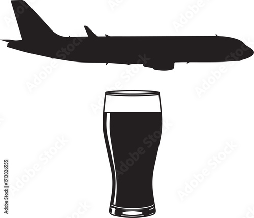 Commercial airplane silhouette and tall glass of cold dark beverage
