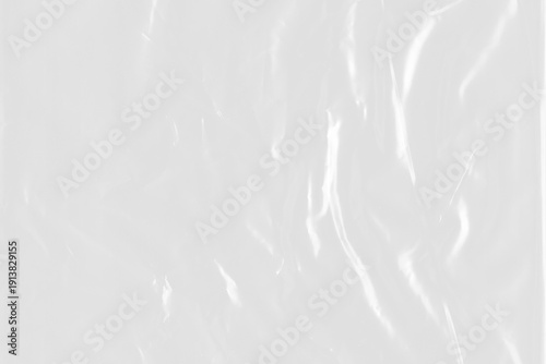 Plastic wrap texture isolated on transparent background with realistic vertical crinkles. A high-quality cutout object for creating packaging mockups or modern grunge design overlays.