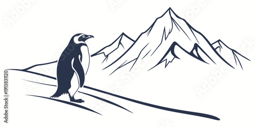 A solitary penguin standing on ice with a mountain range in the background