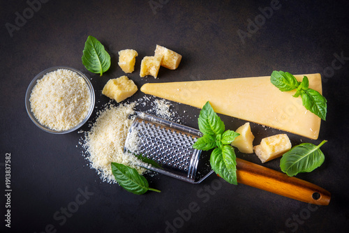 Grated parmesan cheese in t...