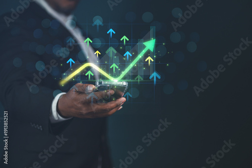 The concept of business, finance, and investment involves business people using digital tools from financial data analysis systems, graphing economic growth, and AI to determine business strategies an