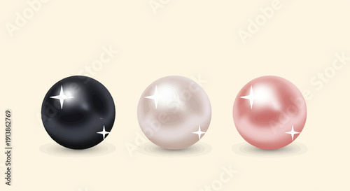 Three lustrous, round pearls in varying colors, glimmering