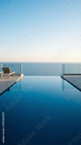Infinity pool reflecting the sunset sky, luxurious resort view, serene landscape, vacation luxury, peaceful retreat.