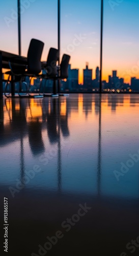 Empty conference room with cityscape view at sunset, reflective floor