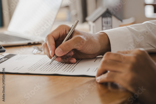 Obraz na płótnie Hand of landlord, realtor pointing sign signature contract rental, purchase, buyer home or apartment with tenant, client after banker agreement mortgage, loan success or done