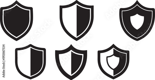 Set of black and white shield icons on white