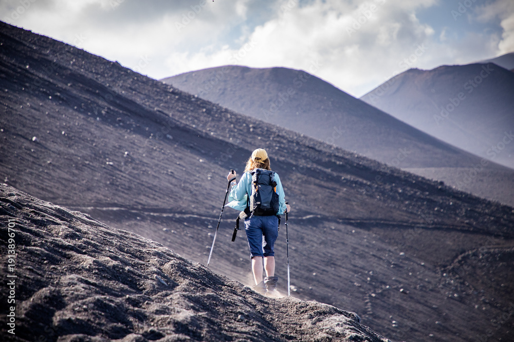 Fototapeta premium hiker trekking on mount Etna