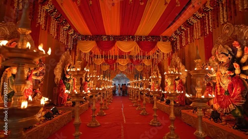 Festive Hindu Pandal Decoration Lit with Oil Lamps during Durga Puja
