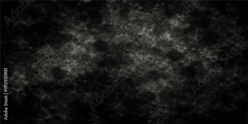 Abstract black and white smoke clouds swirl through a dark night sky creating a textured fog and motion design reminiscent of a stormy nature explosion in space