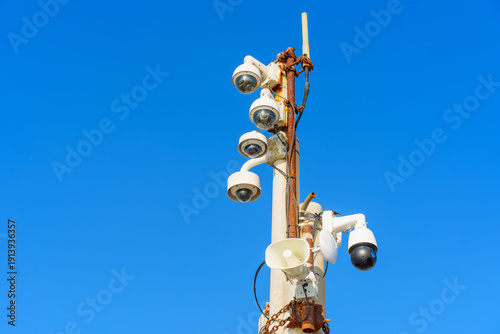 Wallpaper Mural Comprehensive Surveillance Pole with Cameras under a Clear Blue Sky Torontodigital.ca
