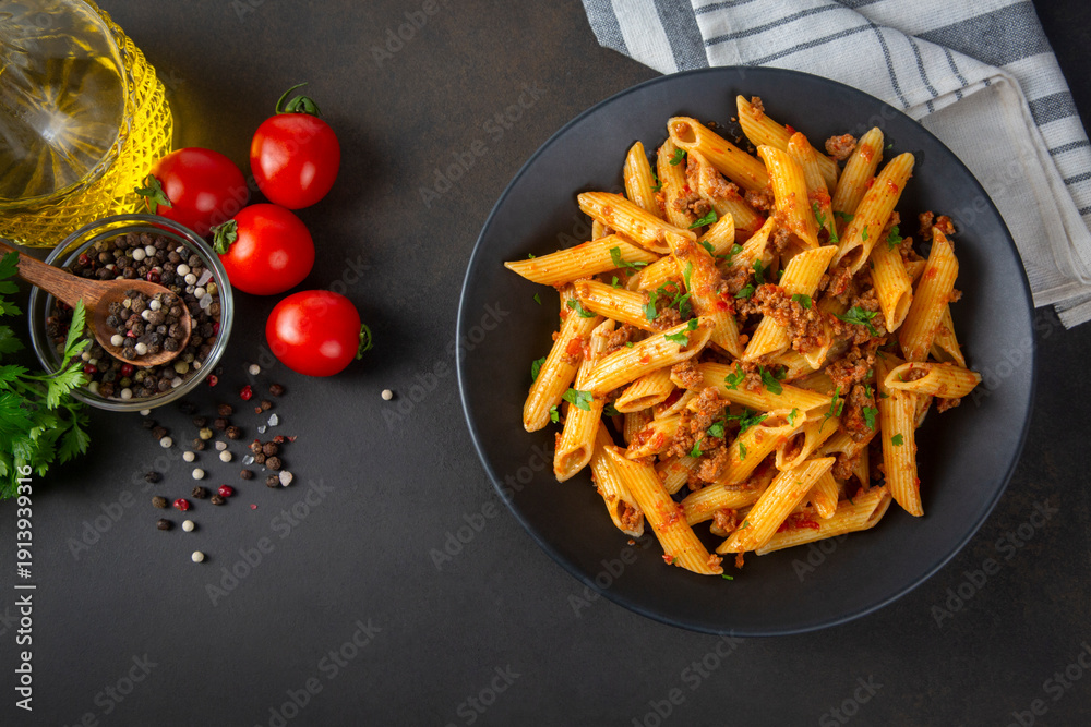 Ταπετσαρία Penne pasta with minced meat and tomato sauce