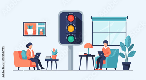 Two people sitting indoors, each with a laptop, near a traffic signal