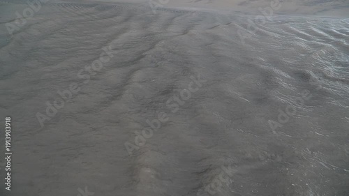 Shallow River Stream Merging into the Sea