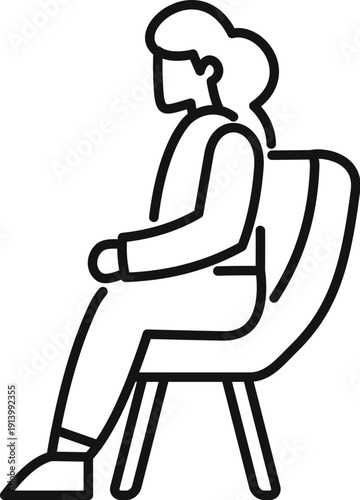 Woman sitting on a chair, patiently waiting
