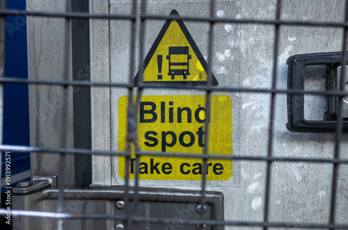 Blind spot sign on truck warning