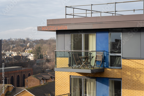 Modern balcony with table and chairs
