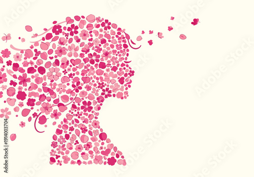 Woman's face made of pink flowers and petals in profile