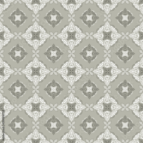 Seamless vector ornamental pattern with vintage arabesque medallion design in neutral gray tones. Elegant moroccan and islamic inspired background with decorative symmetry. wallpaper, textile