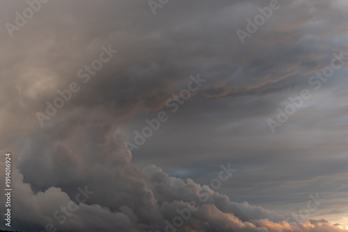 Photos Cumulus and stratus clouds form during evening time