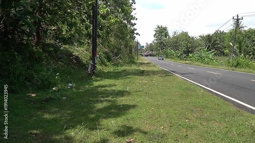 Vehicles Speeding on a Smooth Asphalt Road