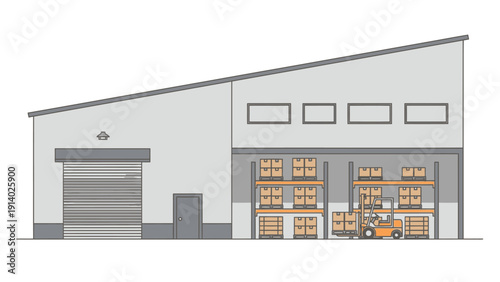 Foto A large gray industrial building with a truck parked outside