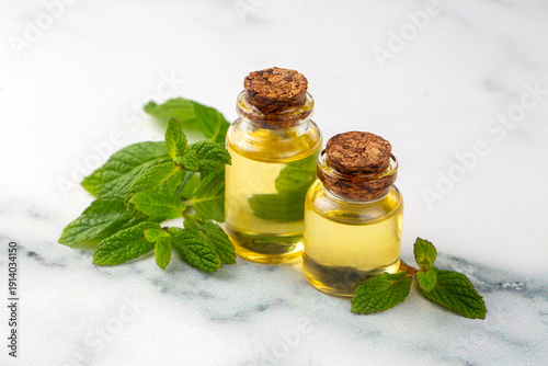 Bottle of mint essential oi...