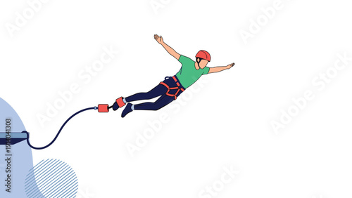 Brave person wearing a safety helmet and harness performing an exciting bungee jump from a high platform into the air.
