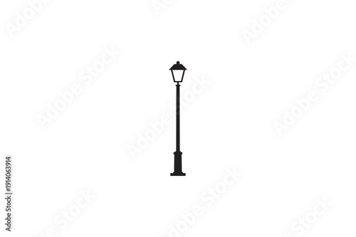 Classic black street lamp post isolated on a pristine white background, a simple and elegant design