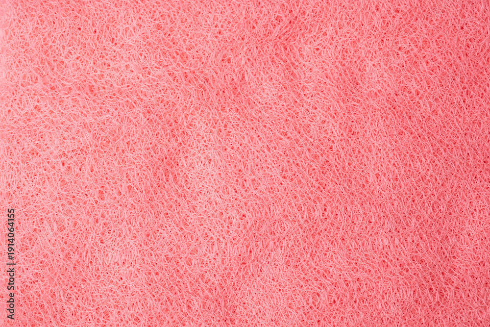 Fototapeta premium Detailed close up of vibrant pink interwoven synthetic material texture background pattern