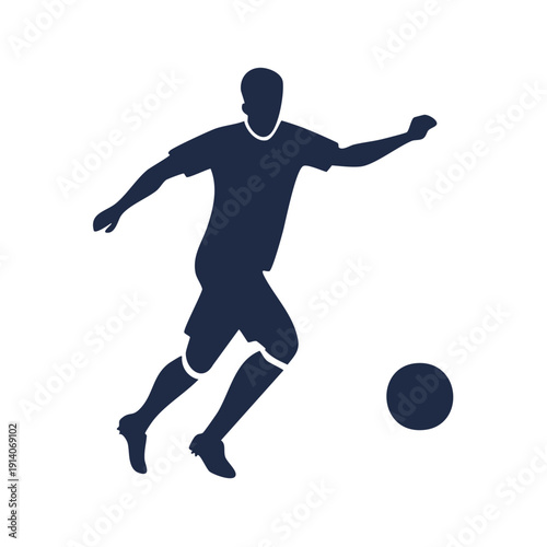 Silhouette of a soccer player kicking a ball with dynamic movement and action