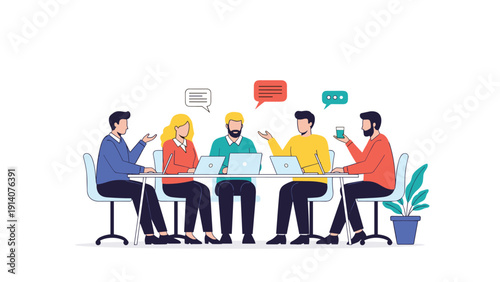 Group of five diverse business professionals sit around a long conference table while having a productive meeting with laptops and discussion.