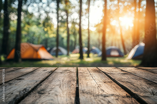 Scenic forest camping site with glowing evening sunset and wooden table surface in focus, generative ai