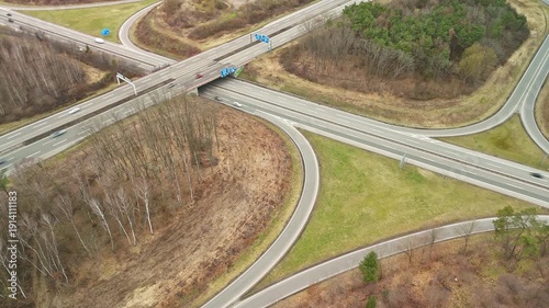Aerial Drone View of Highway Interchange with Curved Ramps in Autumn