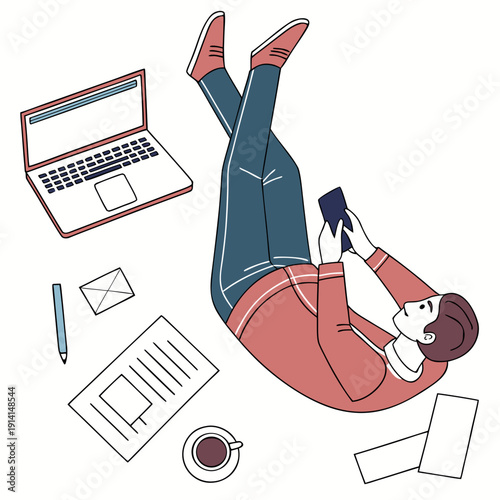 Overhead view of person leaning on floor with laptop and office supplies