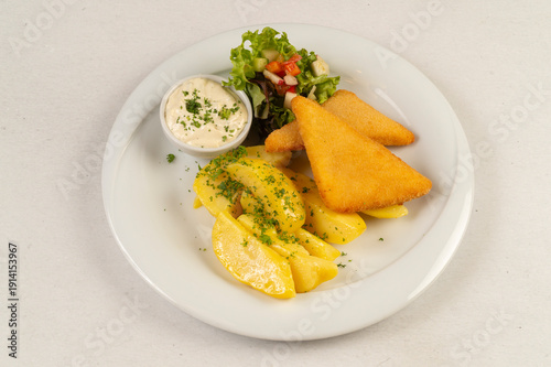 fried cheese with potato end vegetables