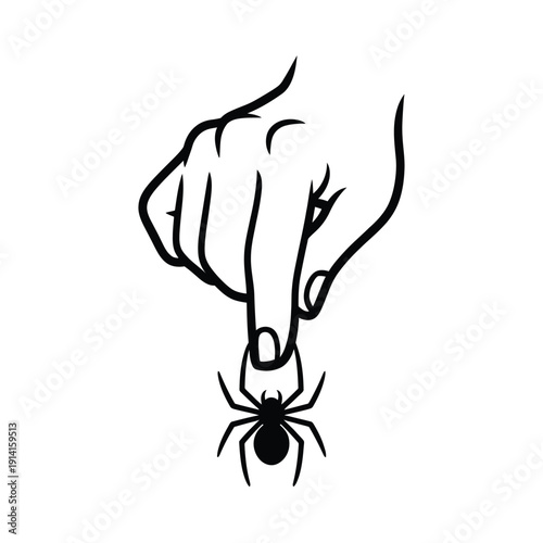 A hand gently holds a small spider in its fingertips