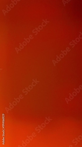 Dynamic Vertical Vintage Light film burn Transition with warm orange and yellow hues, perfect for creative projects.