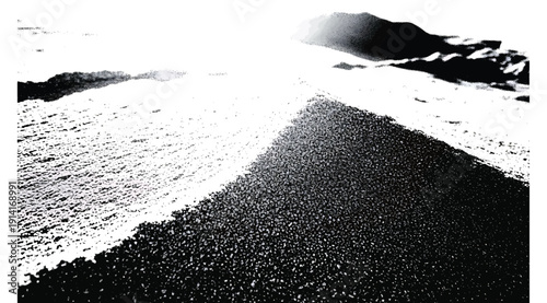 A black and white photo of a road next to a body of water