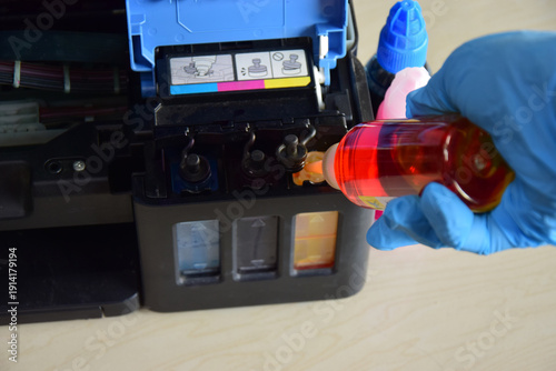 Foto Printer ink Refilling ink for refillable printers.
