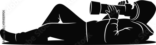 Photographer Lying Down with Camera, Silhouette Vector Illustration