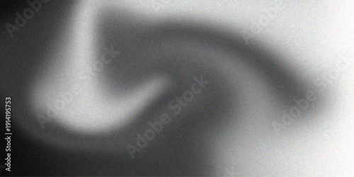 An abstract light background featuring a silver metallic light switch on a brushed steel wall with a smooth satin texture and gray wave pattern design