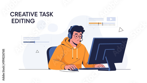 Young man editing video on computer with headset, creative task, digital media