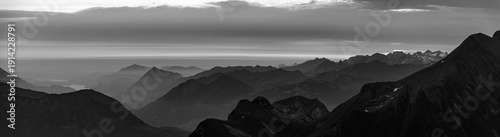 Sunrise over the Bernese alps with mountains Wildgaerst and Schwarzhorn in the foreground