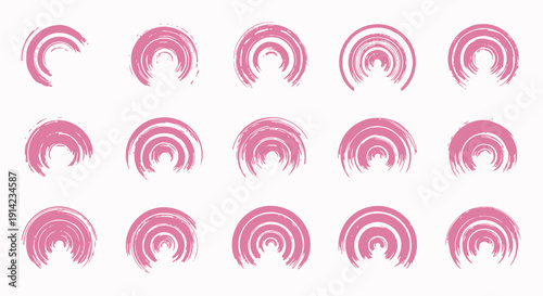 Pink and white candy pieces arranged in a grid pattern on a clean background, viewed from directly above